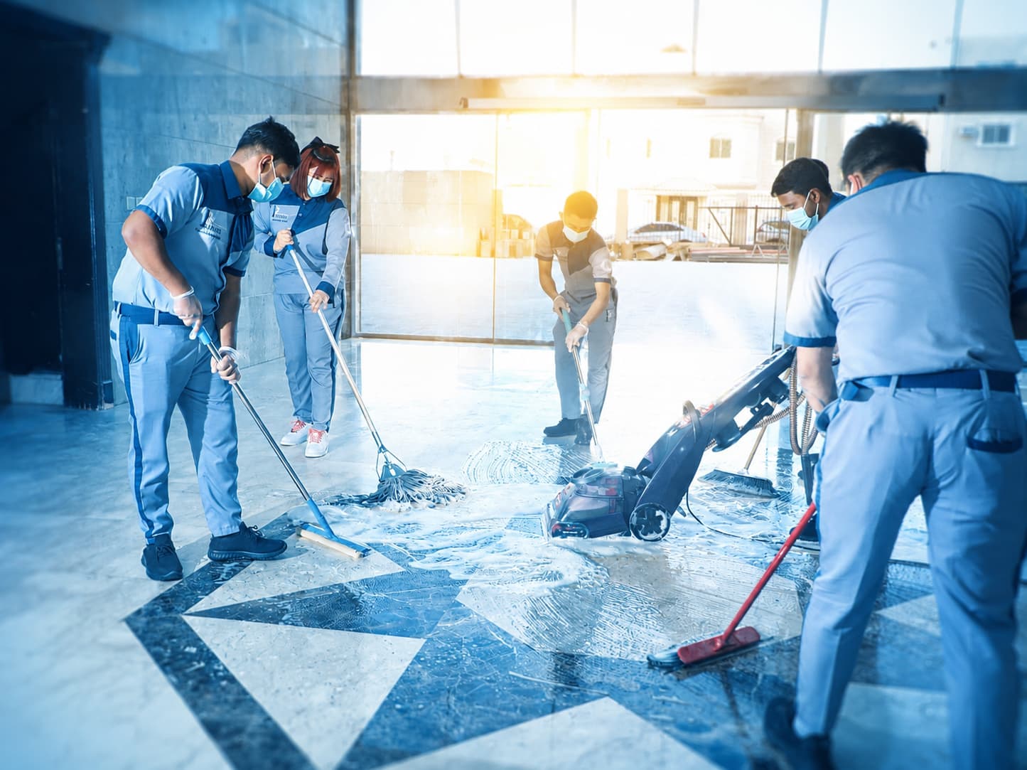 Power Support cleaning team working in branded uniforms